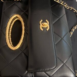 CHANEL Black Quilted Leather Shoulder Bag with Gold Hardware